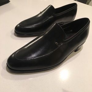 Never used, black Florsheim size 10 dress shoes.